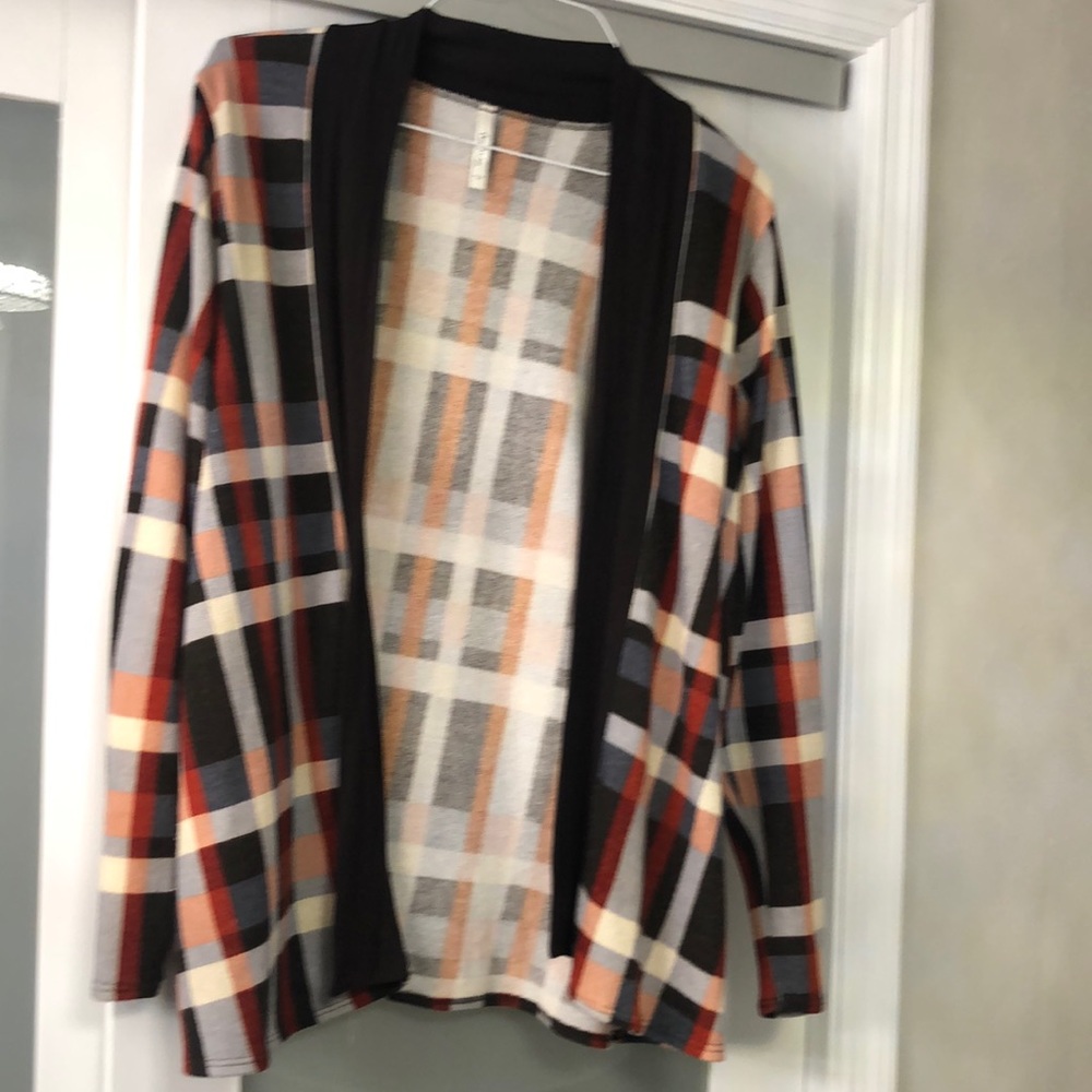 Soft, comfy cardigan with elbow patch detail.